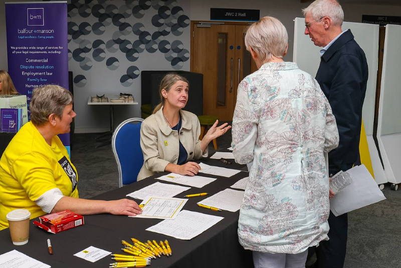 Lorraine welcoming attendees at Health & Wellbeing event